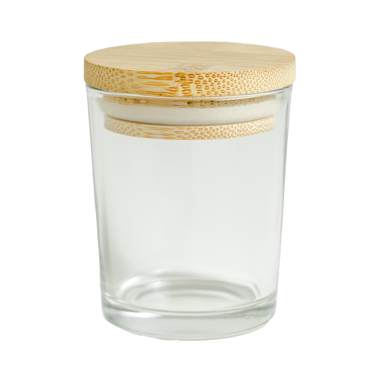 Clear glass jar with a bamboo lid on a white background