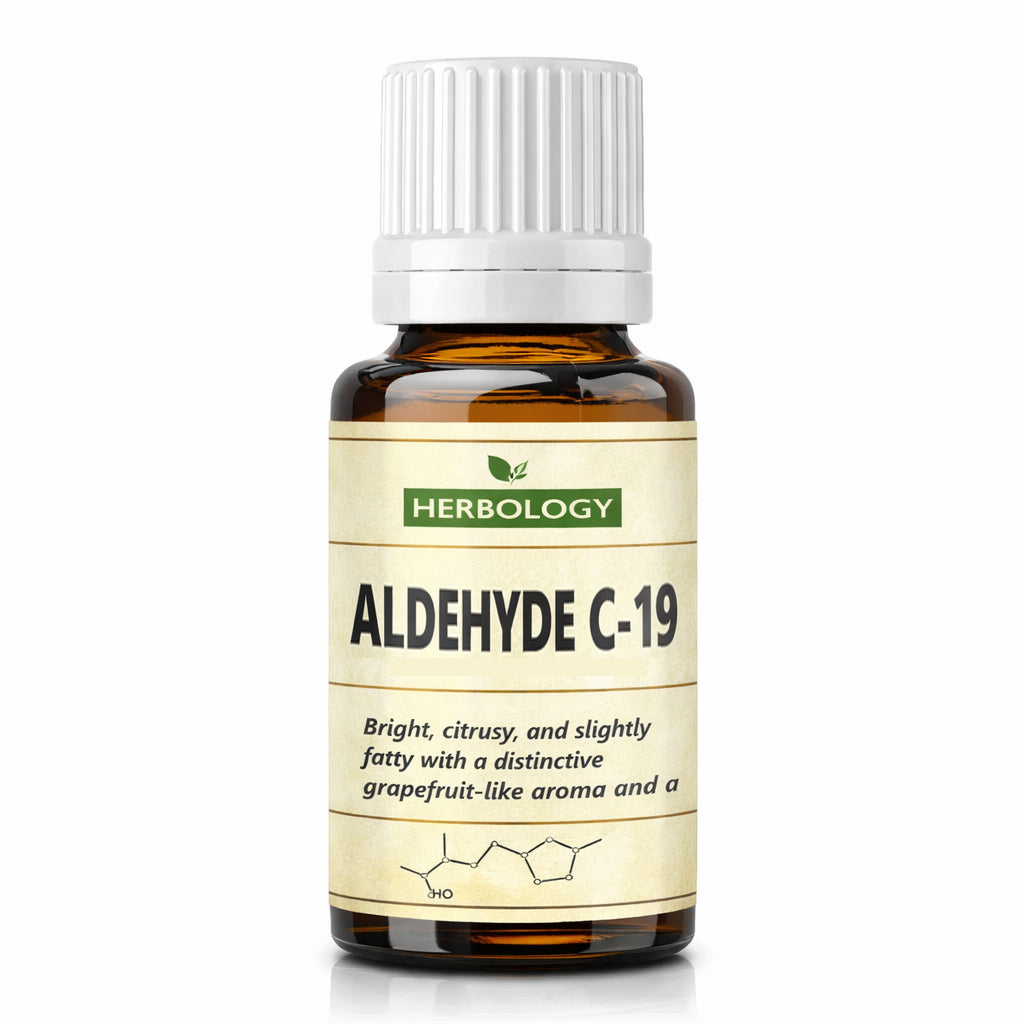 A small amber glass bottle with a white ribbed cap and a cream label reading HERBOLOGY ALDEHYDE C-19, shown on a clean white background.