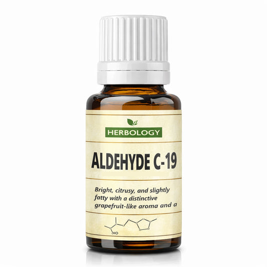 A small amber glass bottle with a white ribbed cap and a cream label reading HERBOLOGY ALDEHYDE C-19, shown on a clean white background.