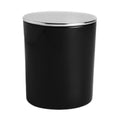 Black cylindrical trash can with a silver lid on a white background