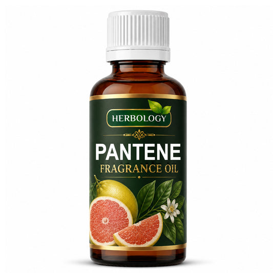 A bottle of Herbology Pantene Fragrance Oil with a white ribbed cap, amber glass bottle, and a dark green label featuring citrus and leaf illustrations.