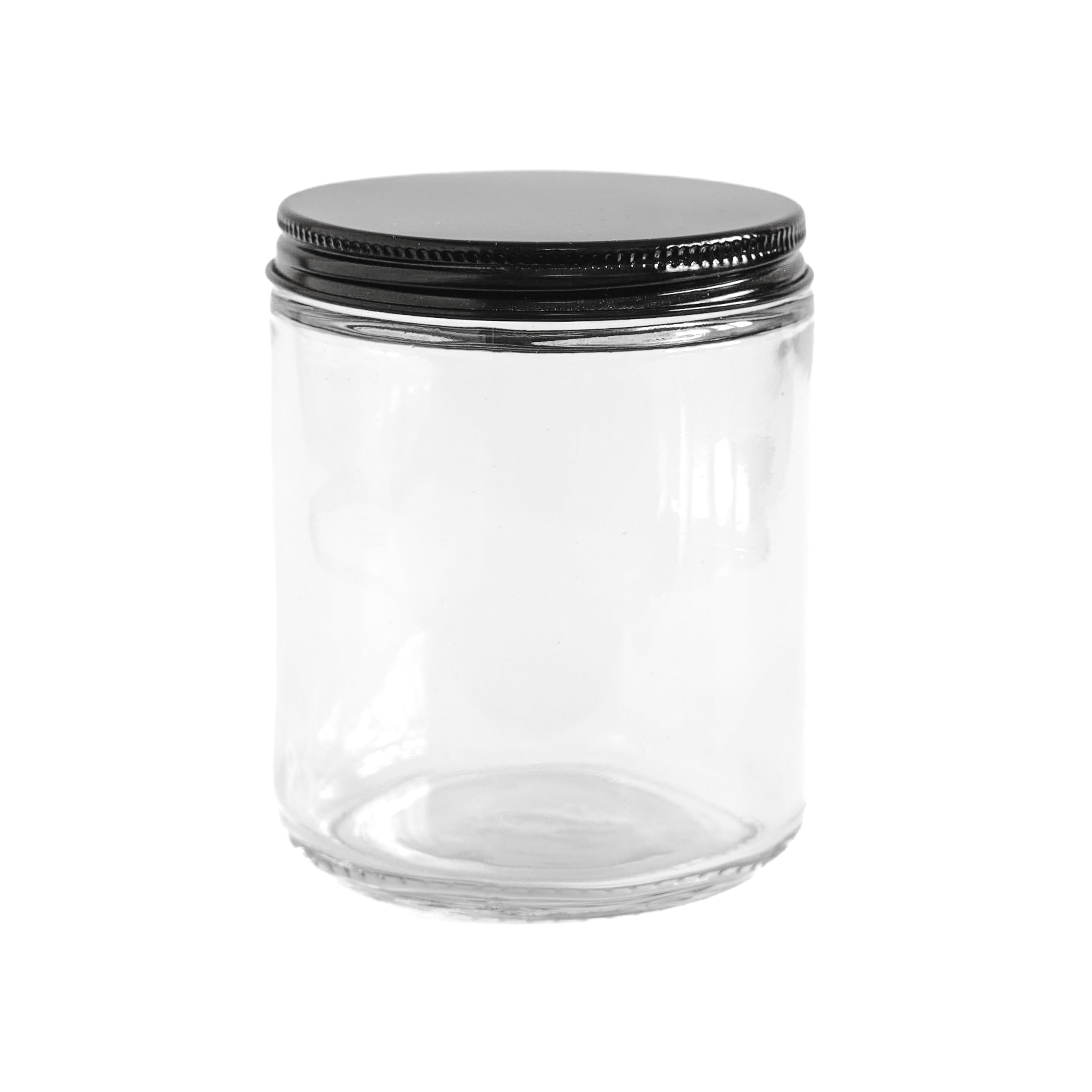 Clear glass jar with a black lid on a white background