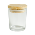 Clear glass jar with a bamboo lid on a white background