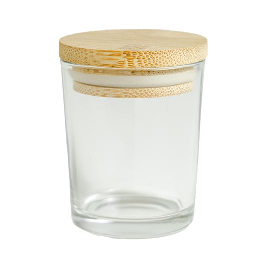 Clear glass jar with a bamboo lid on a white background